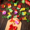image:imageJOYIN 60 PCS Christmas Mini Pop Stress Toy Bulk Xmas Pop Game Party Favors for Kids Christmas Stocking Stuffers for Children Adults Relieve Anxiety Stress Toy