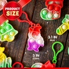 image:imageJOYIN 60 PCS Christmas Mini Pop Stress Toy Bulk Xmas Pop Game Party Favors for Kids Christmas Stocking Stuffers for Children Adults Relieve Anxiety Stress Toy