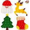 image:imageJOYIN 4 PCS Christmas Pop Stress Toy Xmas Pop Game Party Favors for Kids Squeeze Bubble Christmas Goodies Bag Fillers for Children Adults Anxiety Stress Reliever Office Desk