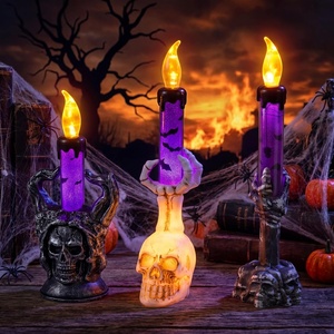image:imageJOYIN Halloween Candle Lights 3 Pcs Skull LED Candle Decorations Set with 3 Designs Spooky Flameless Candle Lights for Halloween Decorations Indoor Tabletop Mantel Party Supplies