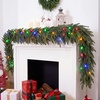 image:imageJOYIN 9FT Christmas Cedar Pine Garland with Multi Color LED Lights Real Touch Christmas Garland with Remote Control amp Timer amp 12 Modes for Porch Mantel Staircase Indoor Xmas Party Decorations9 FT