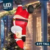 image:imageJoiedomi 6 FT Tall Hanging Christmas Santa Inflatables Decoration Christmas Inflatable Santa Hanging Upside Down Blow Up Yard Decoration with Builtin LED for Indoor Outdoor Yard Roof Decor