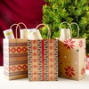 image:imageJOYIN 24 Christmas Kraft Gift Bags for Classrooms and Party Favors Holiday Goody Gift Bags for Xmas Present Wrapping Christmas Decorations Party Supplies Decor 102 x 42 x 63 Brown