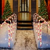 image:imageJoiedomi 12 Pcs Christmas Candy Cane Pathway Markers Lights 17 Stakes Lights with Red Waterproof Outdoor Decorations for Holiday Xmas IndoorYard Walkway Lawn Garden DecorWarm Light